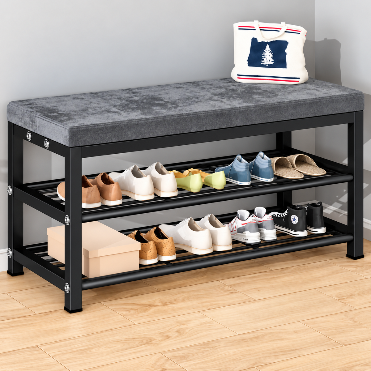 Black and Grey Variant: Black metal shoe storage cabinet with a grey padded cushion seat and two open shoe shelves, displaying assorted footwear in a home entryway.