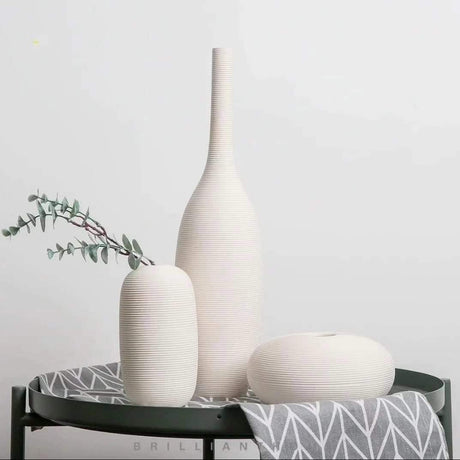 3 Piece Elegant White Ceramic Vase Set Minimalist Decorative Vases for Modern Interiors.