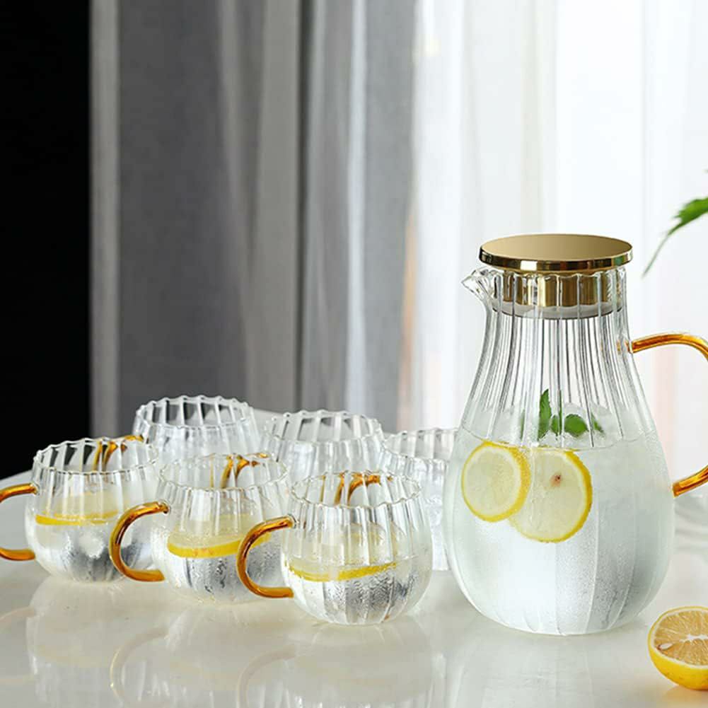 9pcs Transparent Borosilicate Glass Teapot & Jug Set – Includes Jug, Stand, Tray & 6 Snowflake Cups