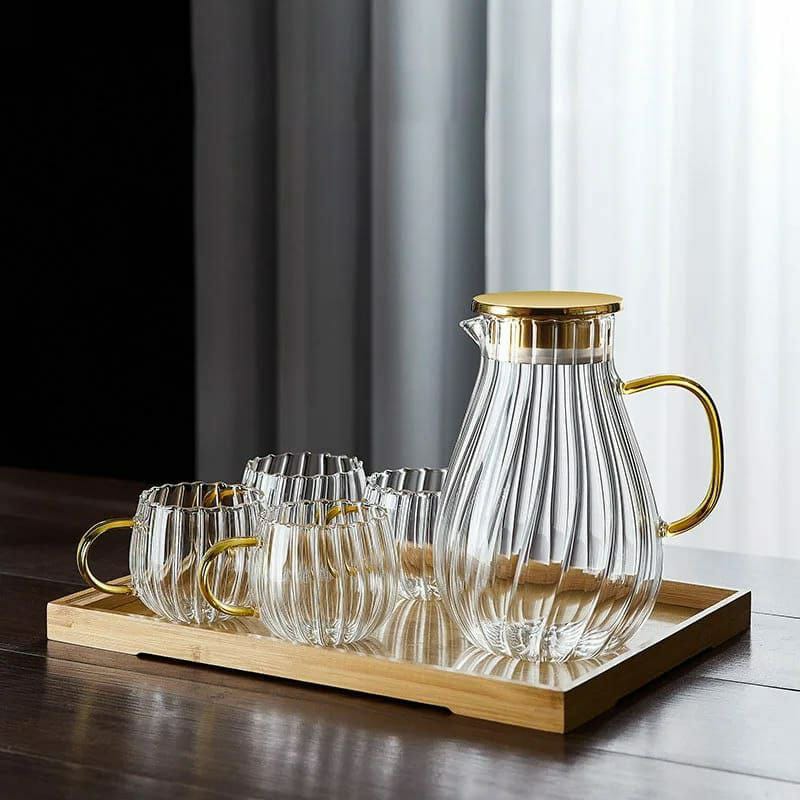 9pcs Transparent Borosilicate Glass Teapot & Jug Set – Includes Jug, Stand, Tray & 6 Snowflake Cups