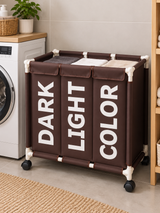 Coffee brown three-compartment laundry basket and four wheels.