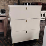 3-Door Modern Shoe Cabinet–Cream Finish with Gold Handles and Fold-Out Storage Design
