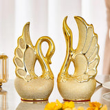 Elegant 2 Piece Swan Ornaments | Frosted Ceramic with Golden Accents