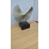 Elegant Golden Decor with Black Carbon Base