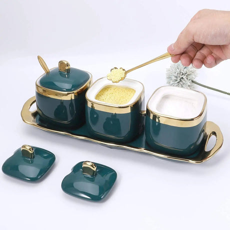 Furaha Finds Luxurious Sugar and Spice Dish Set. Includes 3 elegant jars, 3 gold tea spoons, and a tray. Perfect for stylish storage and serving