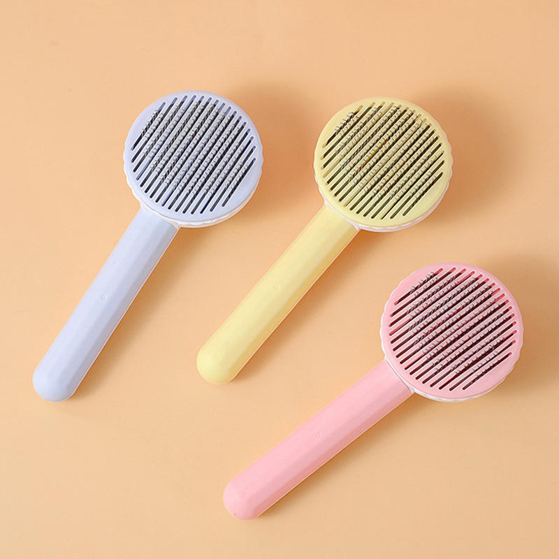 Self Cleaning Pet Comb | Stainless Steel Grooming Brush. Available in White, Pink, Blue, Grey, Green, and Yellow