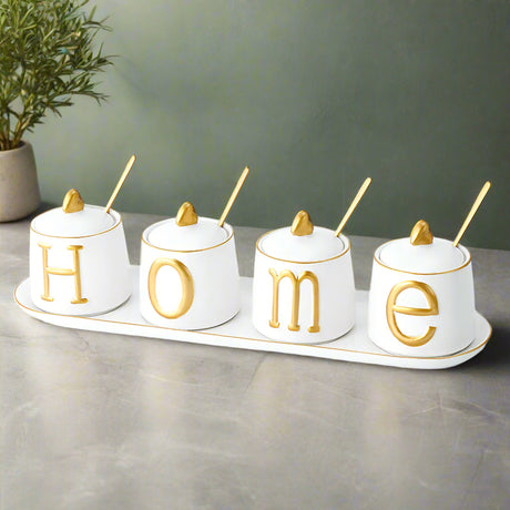 Furaha Finds Luxurious Sugar and Spice Dish Set with 4 elegant jars, 4 gold spoons, and 1 tray. Perfect for kitchen storage and stylish serving