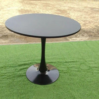 Round Black Pedestal Dining Table with Sleek Modern Base