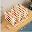 Furaha Finds 4 Layer Automatic Egg Roller Sliding Tray Space saving, stackable egg storage organizer with a rolling system for easy access in refrigerators and kitchens.