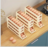 Furaha Finds 4 Layer Automatic Egg Roller Sliding Tray Space saving, stackable egg storage organizer with a rolling system for easy access in refrigerators and kitchens.