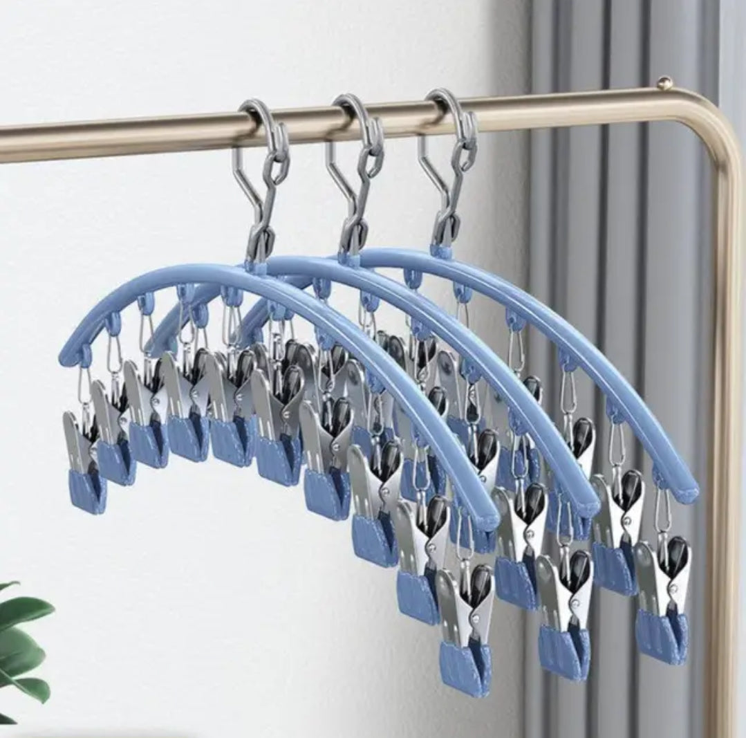 Furaha Finds 10 Pegs Stainless Steel Clothes Drying Hanger Windproof, rust resistant clothing rack with strong clips for socks, underwear, and baby clothes.