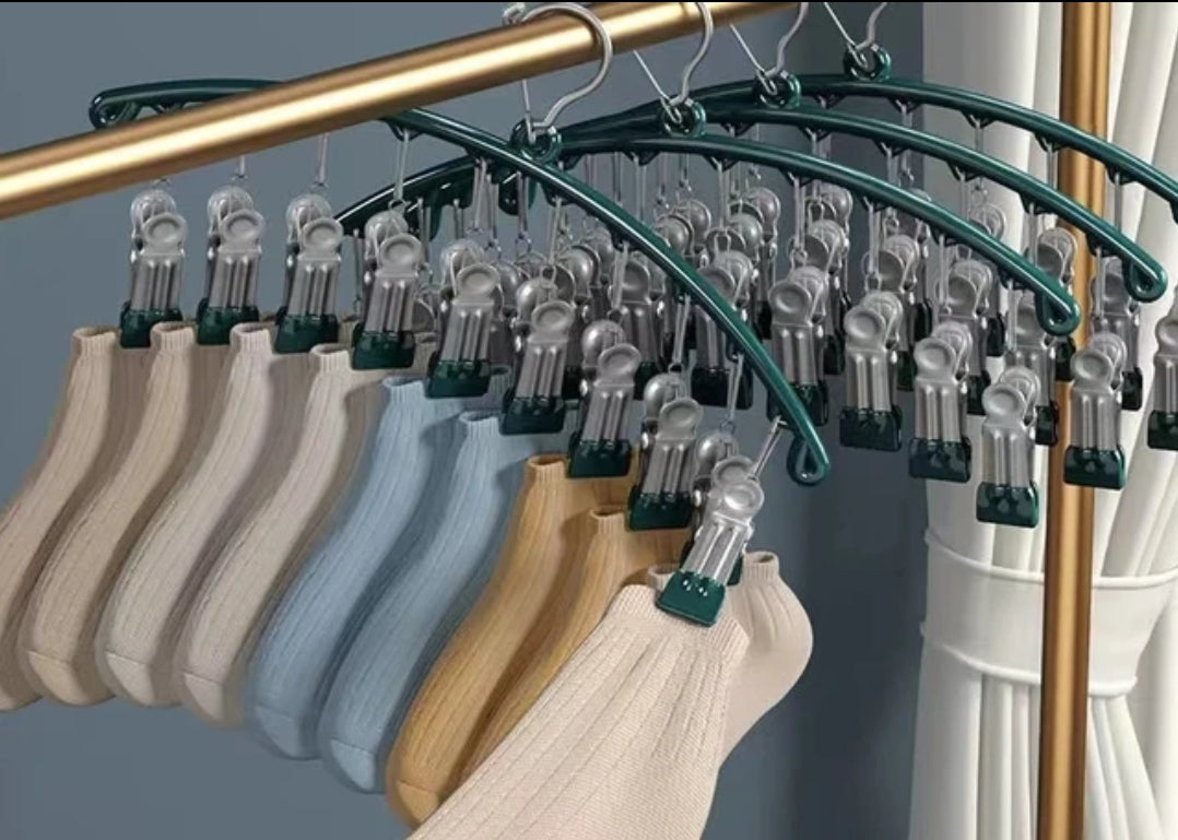 Furaha Finds 10 Pegs Stainless Steel Clothes Drying Hanger Windproof, rust resistant clothing rack with strong clips for socks, underwear, and baby clothes.