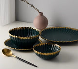 Furaha Finds 36-Piece Nordic Shaped Dinner Set with Gold Rim.