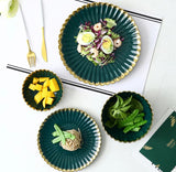Furaha Finds 36-Piece Nordic Shaped Dinner Set with Gold Rim.
