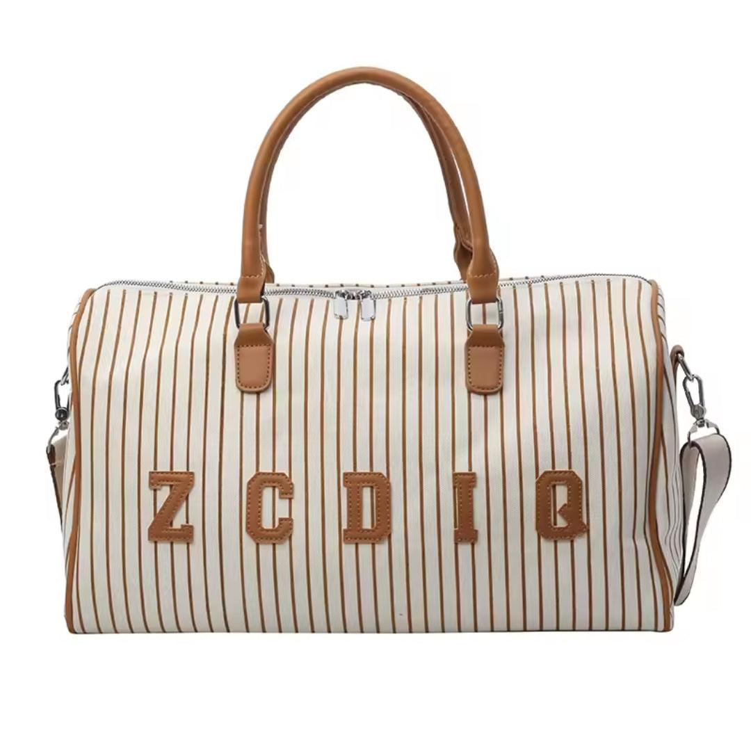 Canvas Travel Gym Duffel Bag Waterproof Stylish and Durable for Weekend Trips and Gym Use- Furaha Finds Kenya