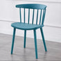 Furaha Finds modern spindle back dining chair in turquoise blue . Contemporary plastic accent chair with a sleek minimalist design