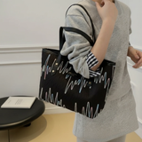 CAHRES & NEKA Holographic Wave Embroidery Monogram PU Tote Bag with Cloud Plush Charm Black Large Bags & Accessories Shopper Bags