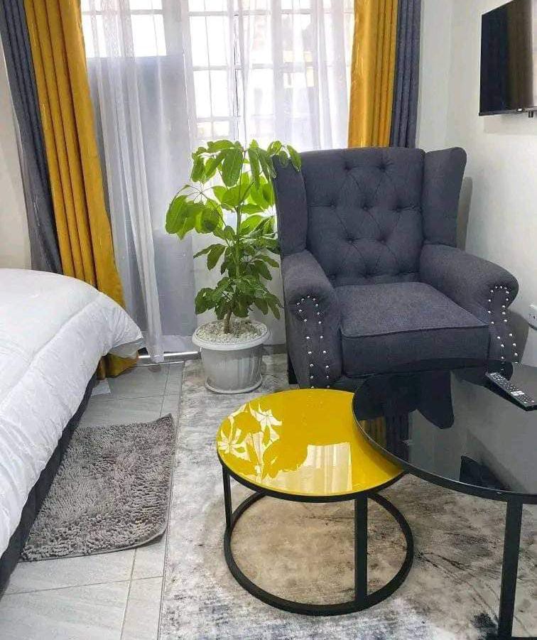 Modern Glass Nesting Tables  Yellow & Black Glass Tabletops