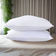Furaha Finds Printed Hollow Bed Pillows with soft microfiber filling. Available in 1000gms and 750gsm pairs. White with stylish patterns for ultimate comfort.