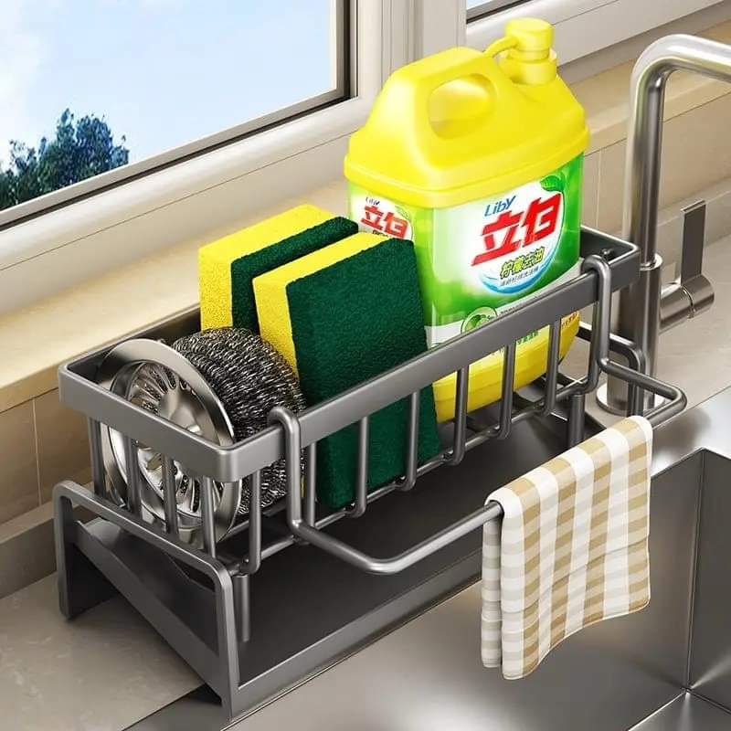 Furaha Finds Kitchen Sink Caddy with Water Draining Tray Carbon steel and plastic, white & black, space saving sink organizer for sponges, brushes, and dish soap.