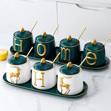 Furaha Finds Luxurious Sugar and Spice Dish Set with 4 elegant jars, 4 gold spoons, and 1 tray. Perfect for kitchen storage and stylish serving
