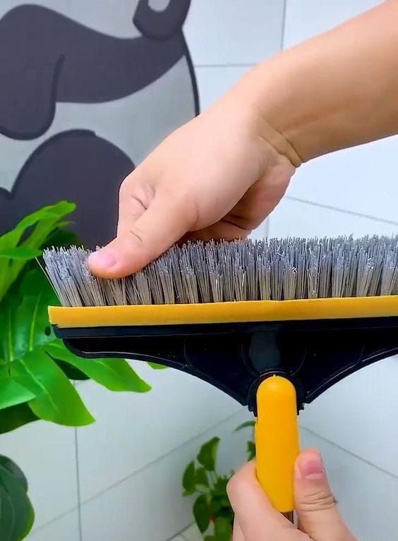 Furaha Finds 2 in 1 V-Shape Magic Broom and Squeegee. Lightweight plastic cleaning tool for wet and dry cleaning. Perfect for kitchens, bathrooms, and pool decks.