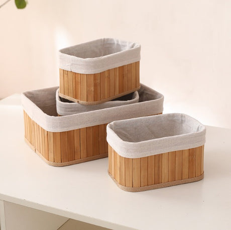 Furaha Finds 4-piece wicker basket set for home organization. Handwoven, durable storage solution in varying sizes for kitchen, bathroom, and living spaces