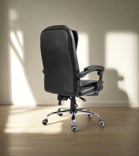 Furaha Finds high-back leather swivel chair with massage and footrest. Luxury reclining computer office chair for ergonomic comfort in offices and gaming setups