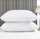 Furaha Finds Printed Hollow Bed Pillows with soft microfiber filling. Available in 1000gms and 750gsm pairs. White with stylish patterns for ultimate comfort.