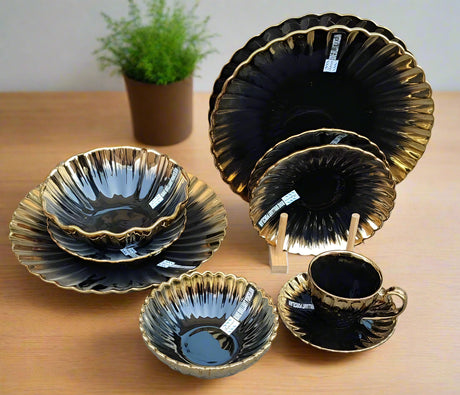 Furaha Finds 36-Piece Nordic Shaped Dinner Set with Gold Rim.