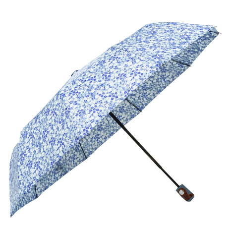 Furaha Finds compact umbrella with a blue floral pattern, featuring an automatic open/close functionality and a comfortable grip handle.