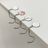 Furaha Finds custom logo metal folding bag holder with cartoon pattern desk side hook stylish compact and perfect for handbags at home office or on the go
