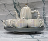 Fine Ceramic 8pcs Rotating Tray Tea Set with 6 Cups and Kettle