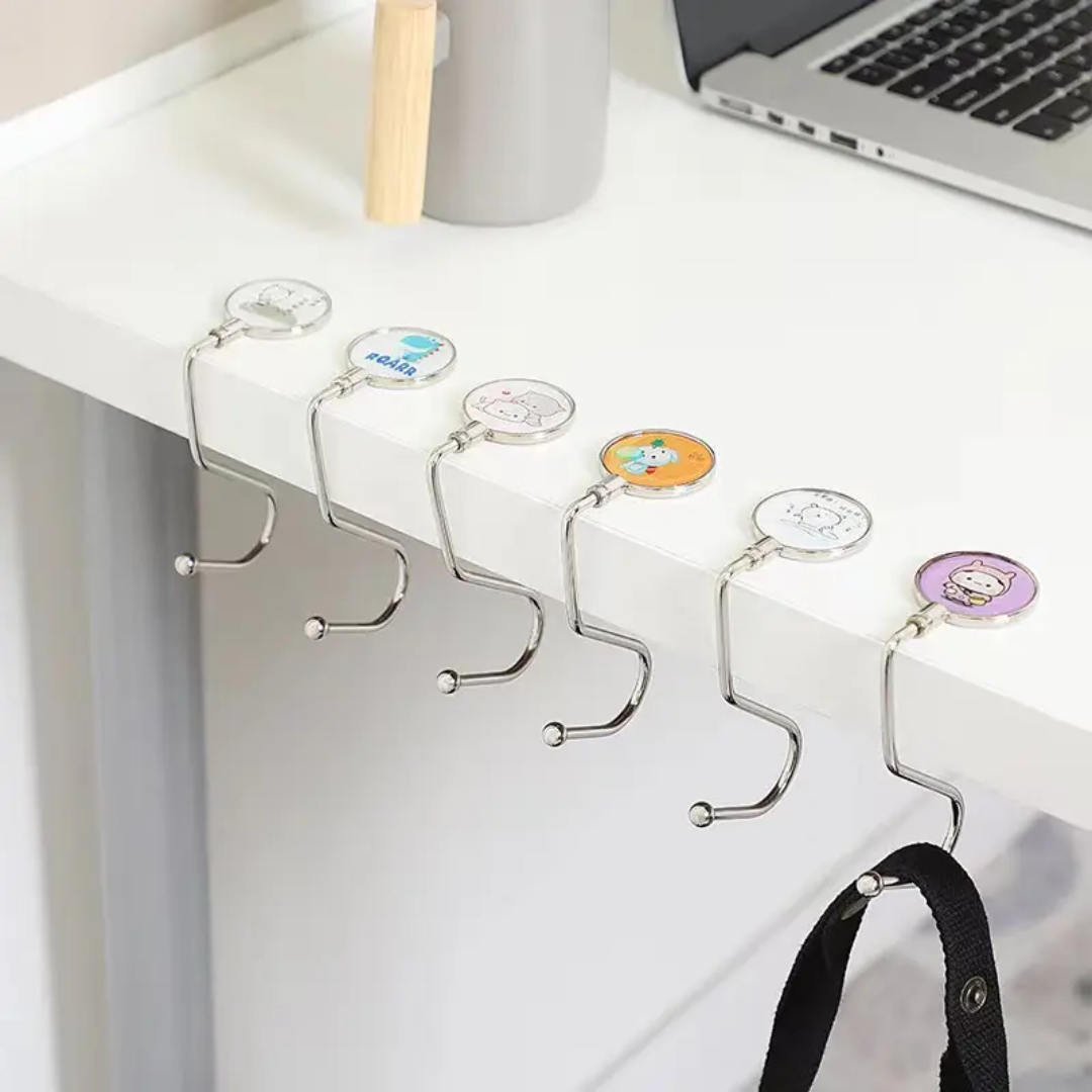 Furaha Finds custom logo metal folding bag holder with cartoon pattern desk side hook stylish compact and perfect for handbags at home office or on the go
