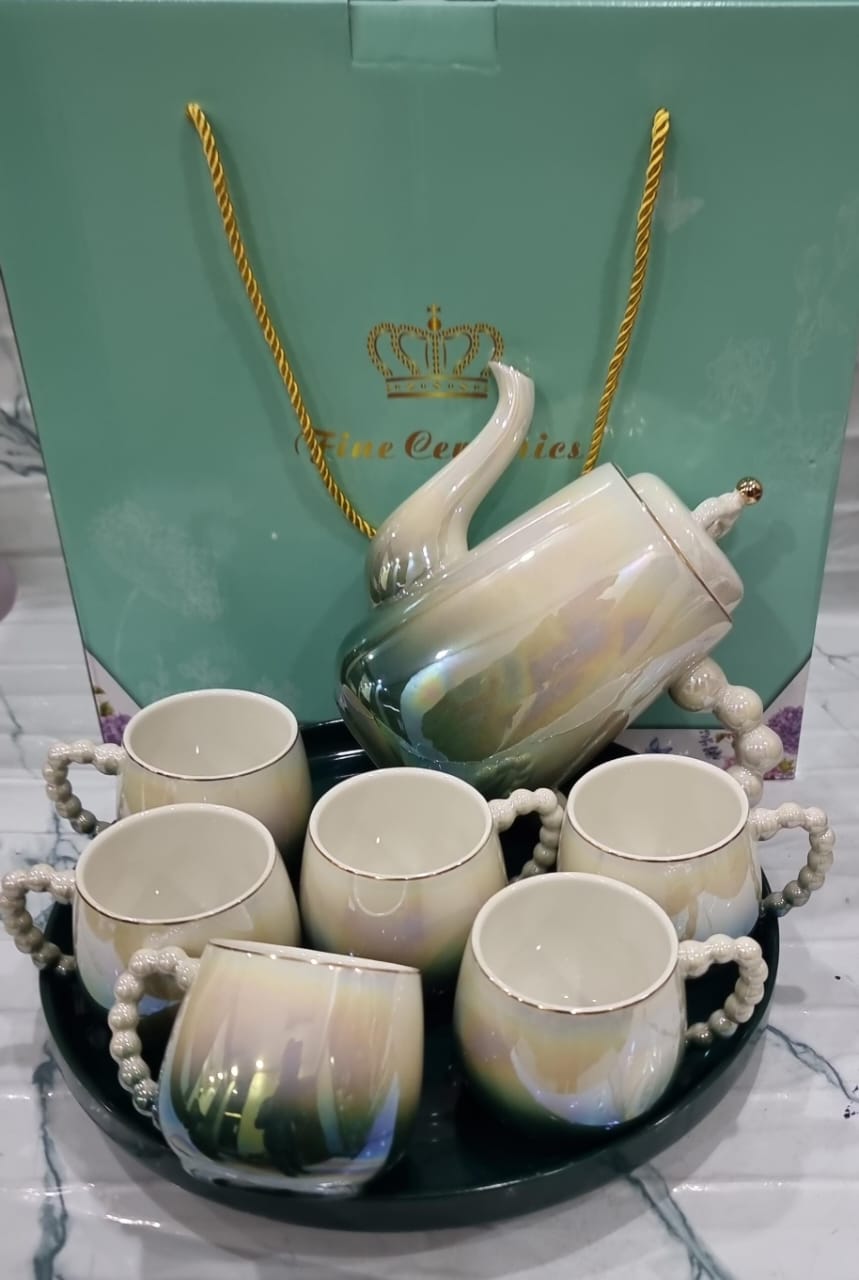Fine Ceramic 8pcs Rotating Tray Tea Set with 6 Cups and Kettle