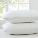 Furaha Finds Printed Hollow Bed Pillows with soft microfiber filling. Available in 1000gms and 750gsm pairs. White with stylish patterns for ultimate comfort.